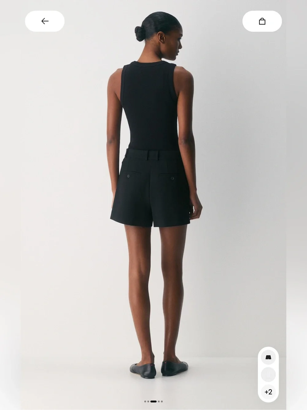 Aritzia Babaton Black Pleated Mini Shorts